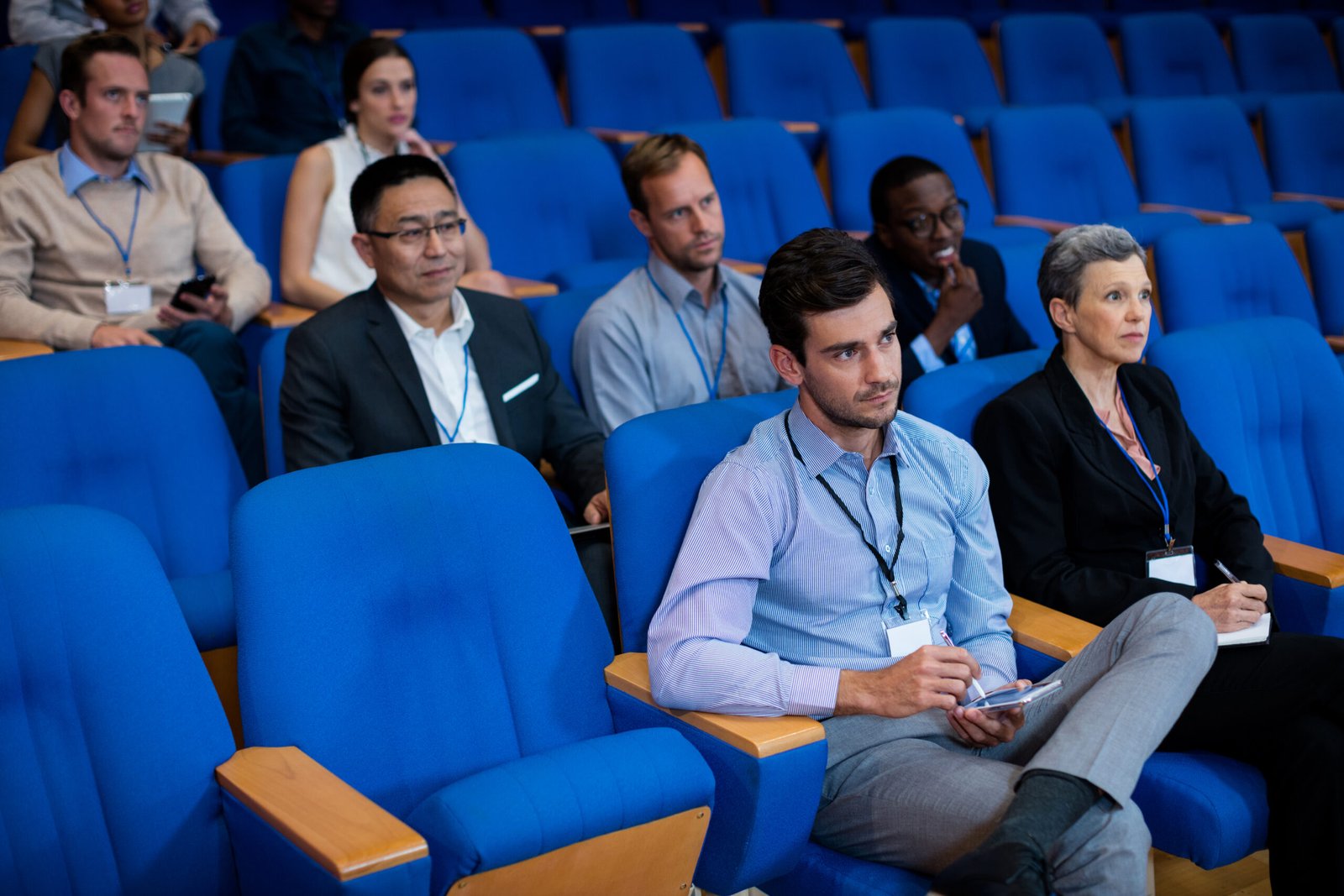 Business executives participating in a business meeting at conference center